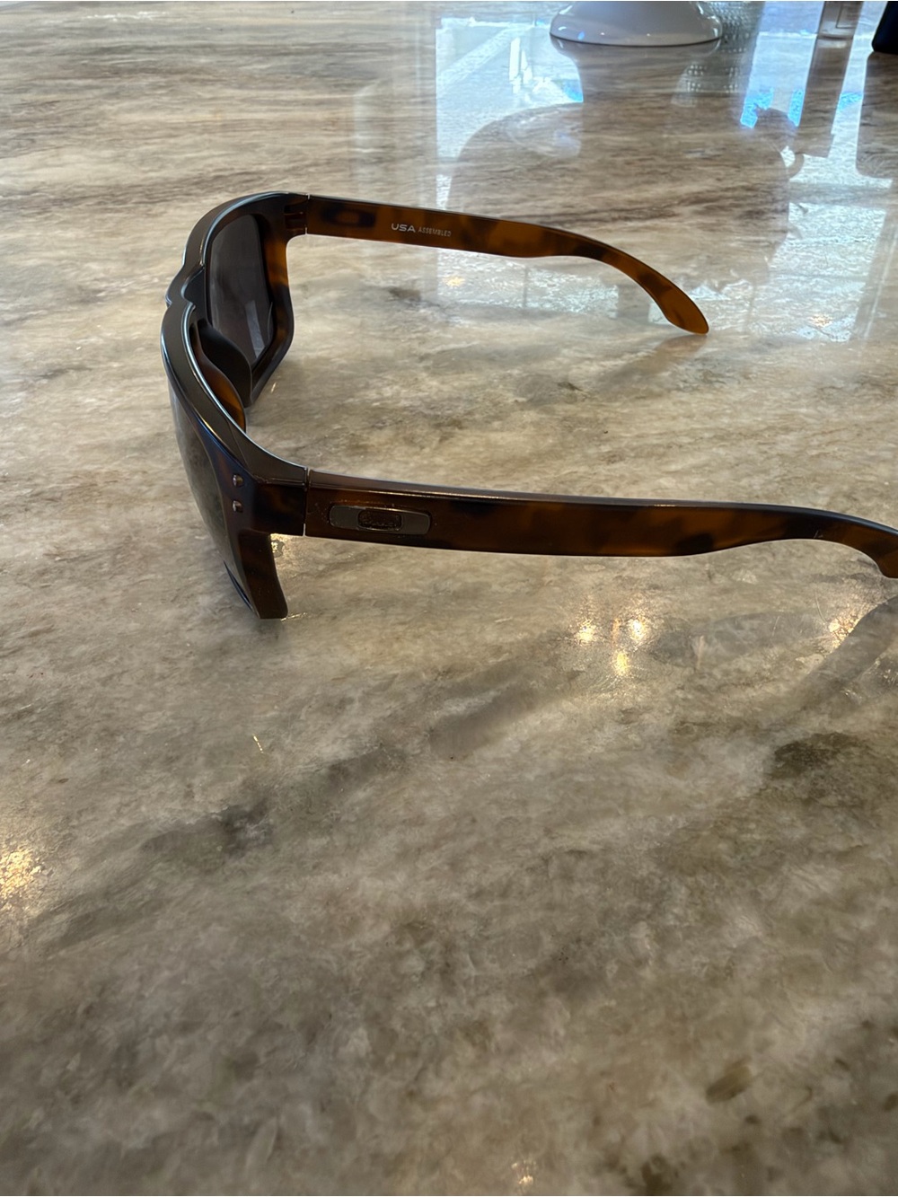 Oakley Tortoiseshell Frame Sunglasses with Brown Lenses